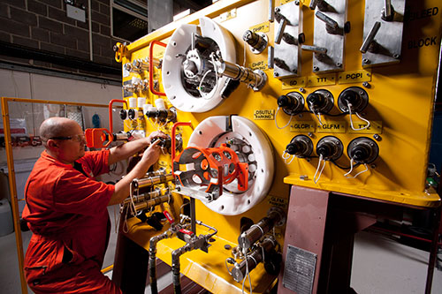 7ProservTechnician working on subsea controls system